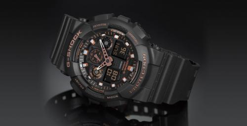 Матово-черные часы GA-100GBX-1A4ER с инверсной индикацией дополнены акцентами Rose Gold на циферблате и корпусе.