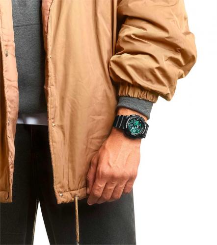 Ненасыщенный зеленый принт часов CASIO G-SHOCK GA-140MG-1AER выполнен в цвете камуфляжа, туристов и военных.