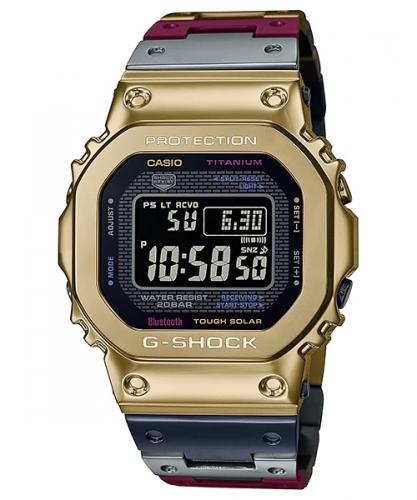 Лимитированные часы из титана CASIO G-SHOCK GMW-B5000TR-9ER TranTixxii в желтом корпусе IP Gold с разноцветным браслетом.