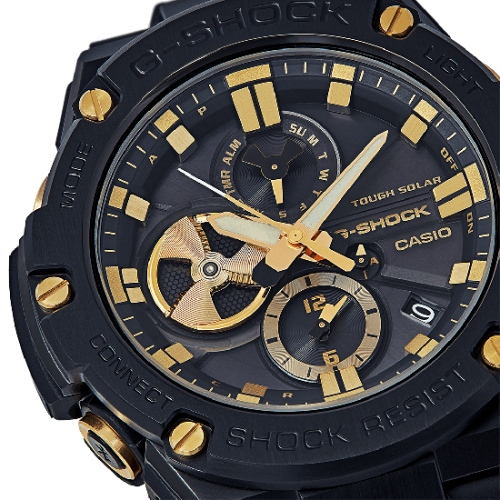 Легко читаемый черный циферблат часов G-SHOCK GST-B100GC-1AER с объемными IP gold индексами, индикаторами и стрелками.