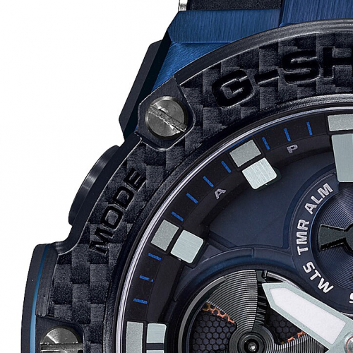 Черный безель часов CASIO G-SHOCK GST-B100XB-2AER изготовлен из углеродного волокна компанией Toray Industries.